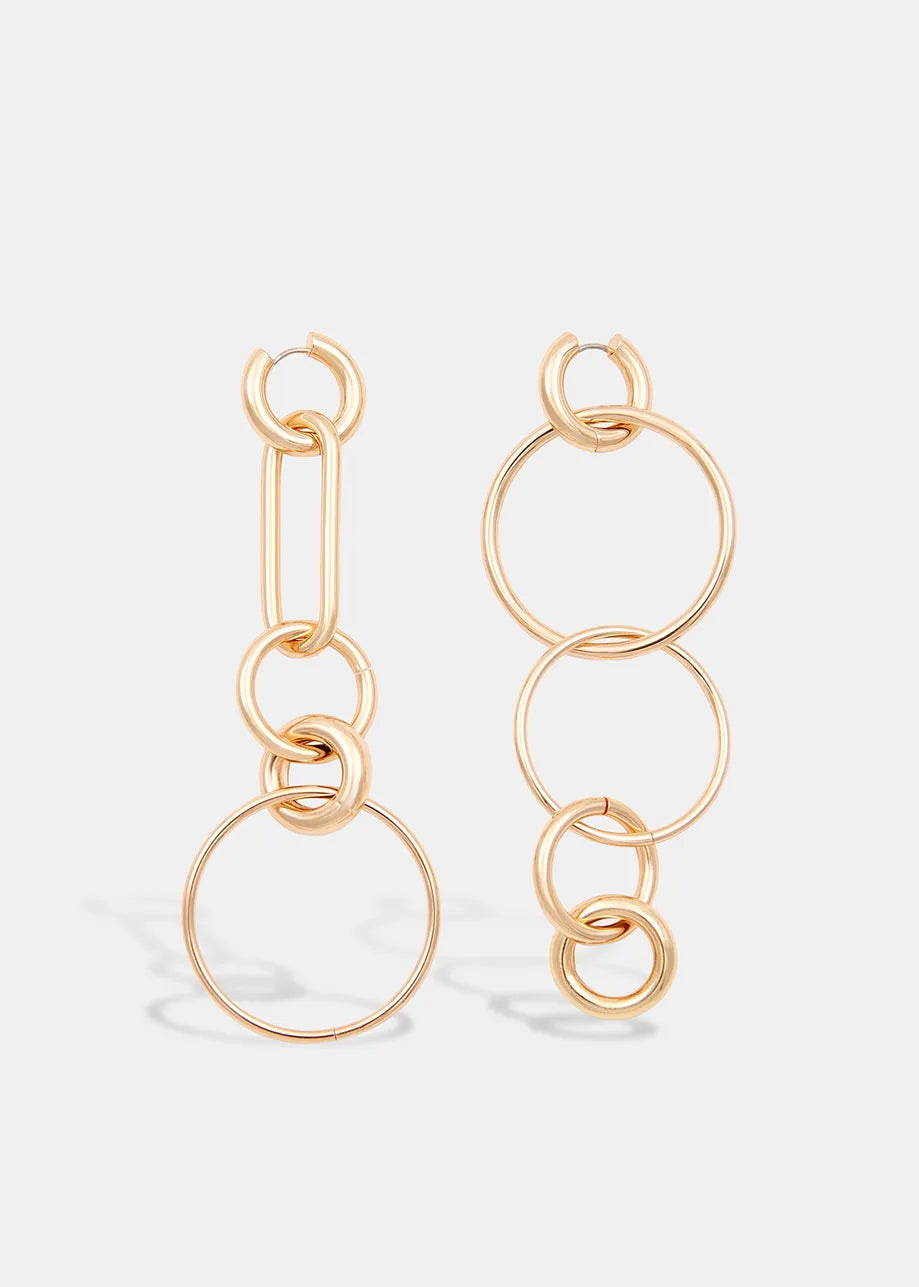 Gold earrings with interlocking hoops