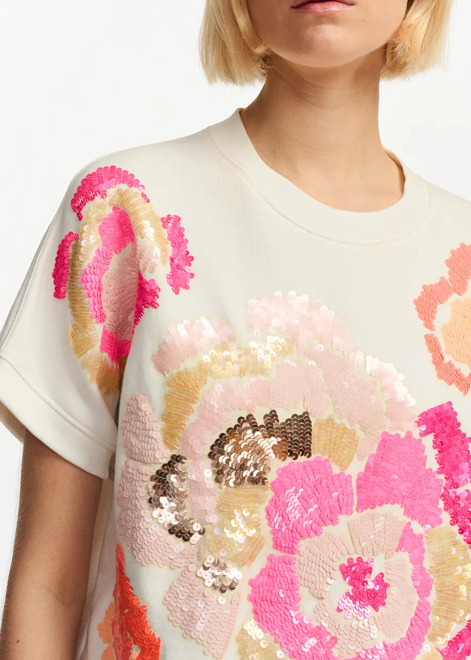 White tee with orange amnd pink sequin floral embellishments