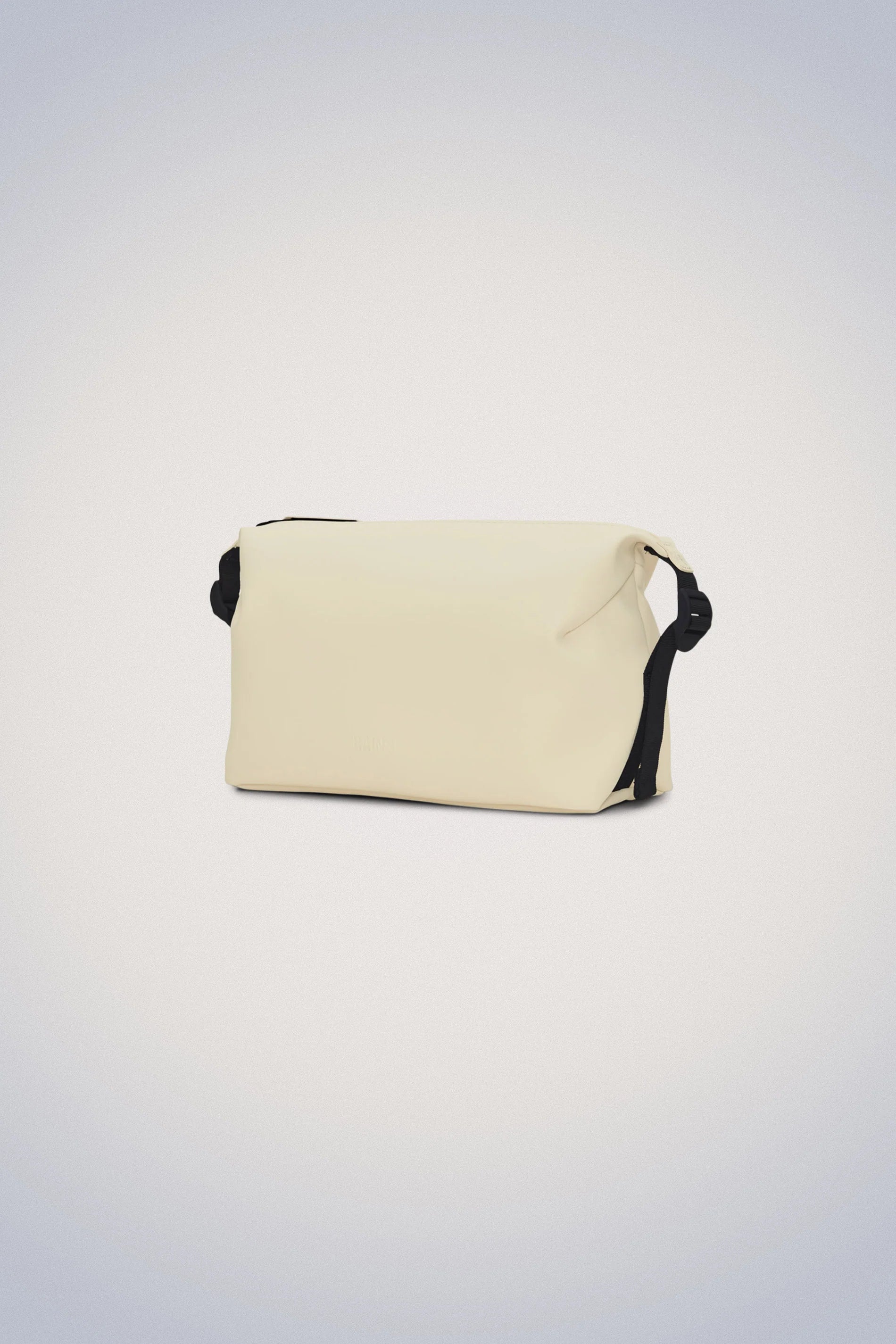 A Hilo Wash Bag - Dune by Rains on a white background.