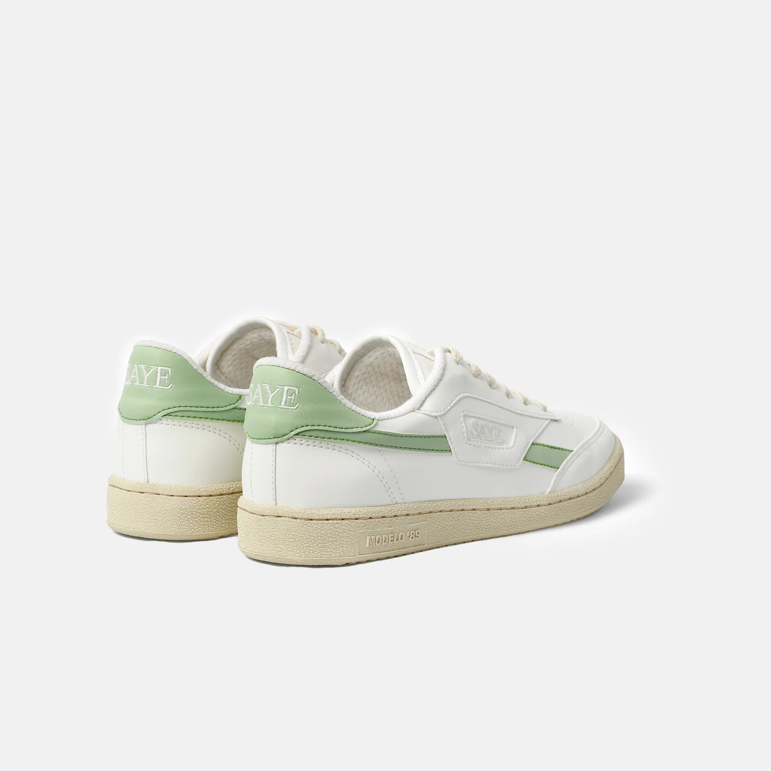 Off white trainers with lime green side detail