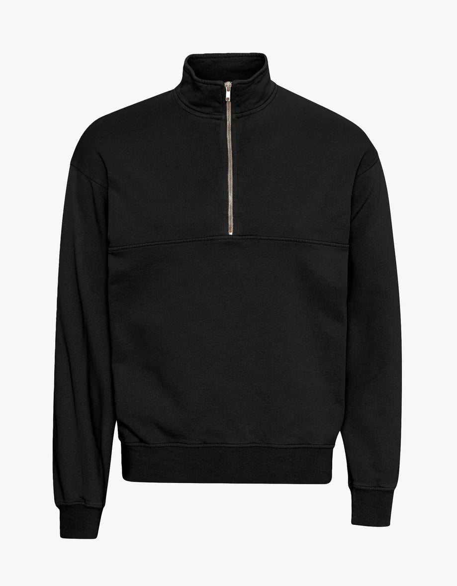A black Organic Quarter Zip sweatshirt with a zipper on the front by Colorful Standard.