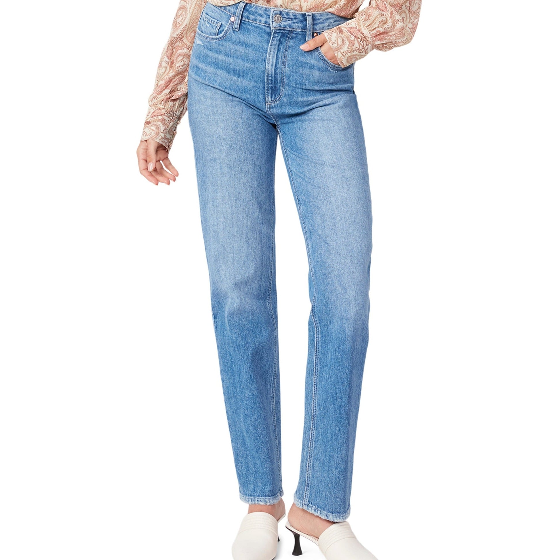 A woman wearing Paige Sarah Straight 30" - Wannabe Distressed jeans and a blouse.