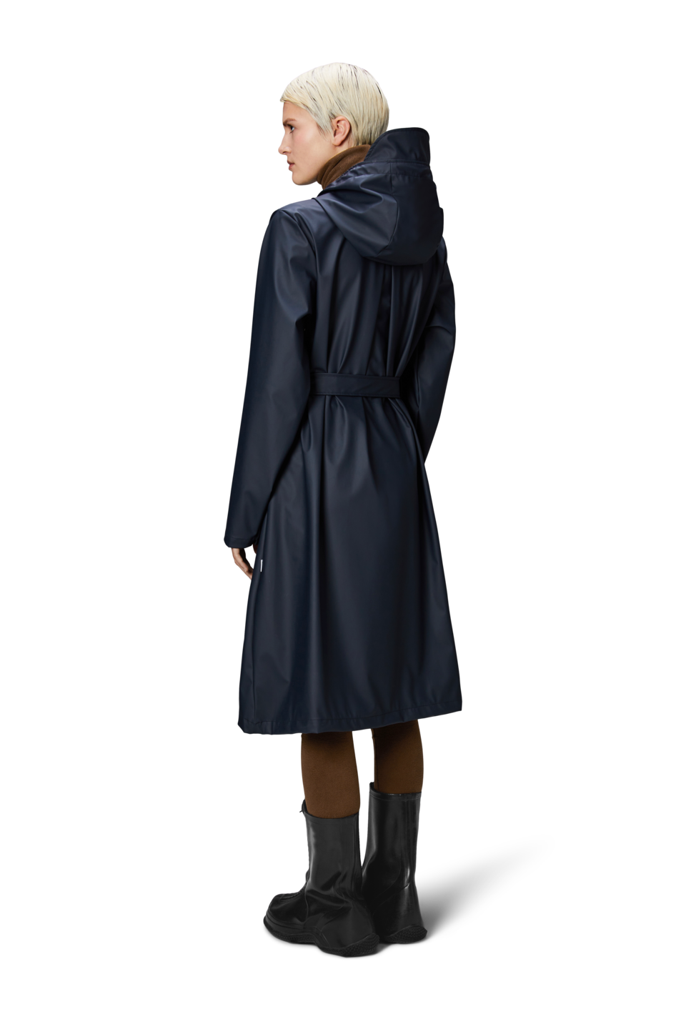 model wears rains navy rain coat