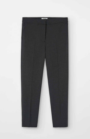 The Alaiak trousers in a dark grey shade set against a white studio background.