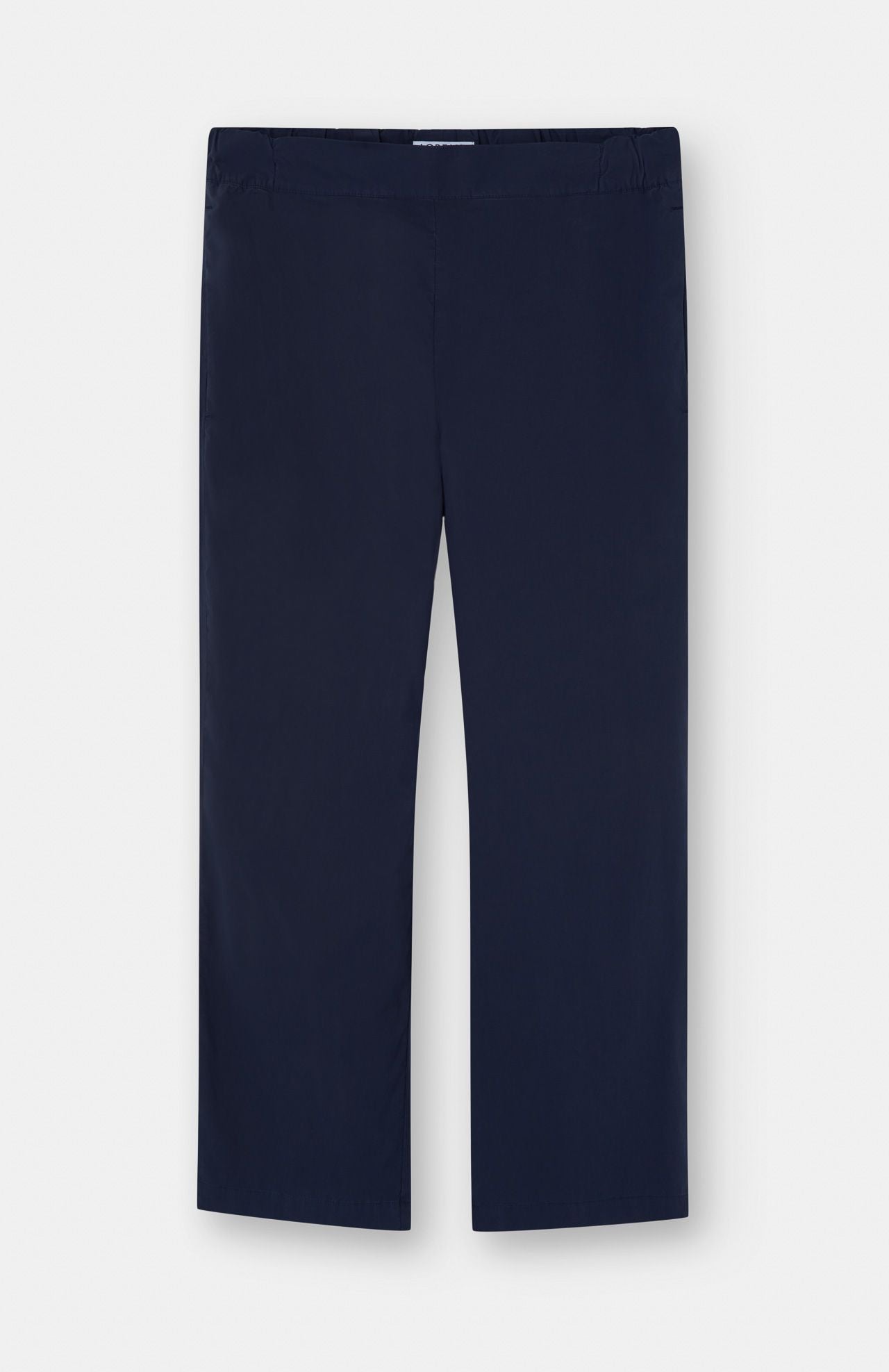 Loreak Mendian's Confya Cropped Trousers in navy blue organic poplin feature a straight-leg cut and are shown against a plain white background.