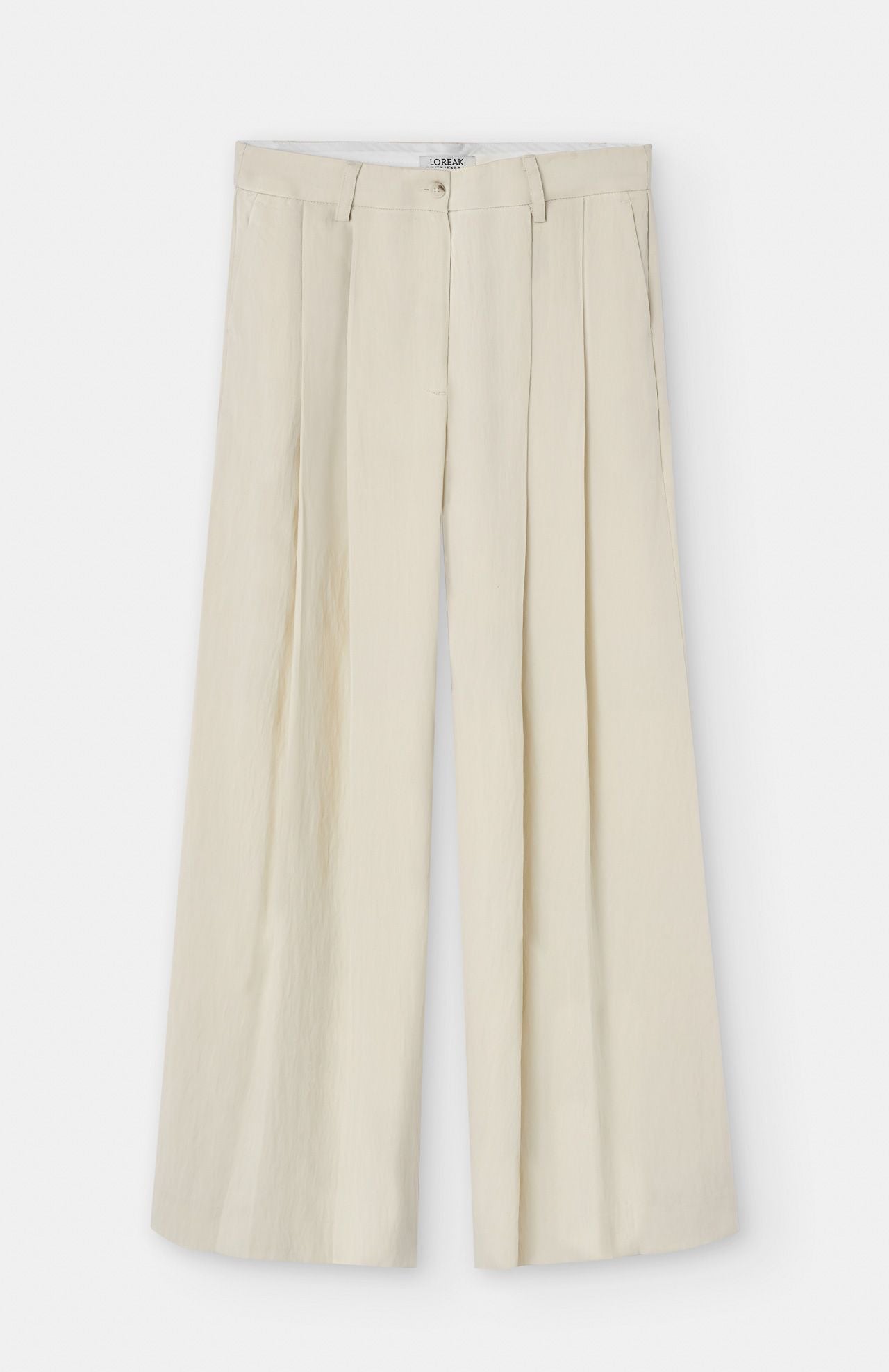 loreak mendian cream pleated trousers on a white background