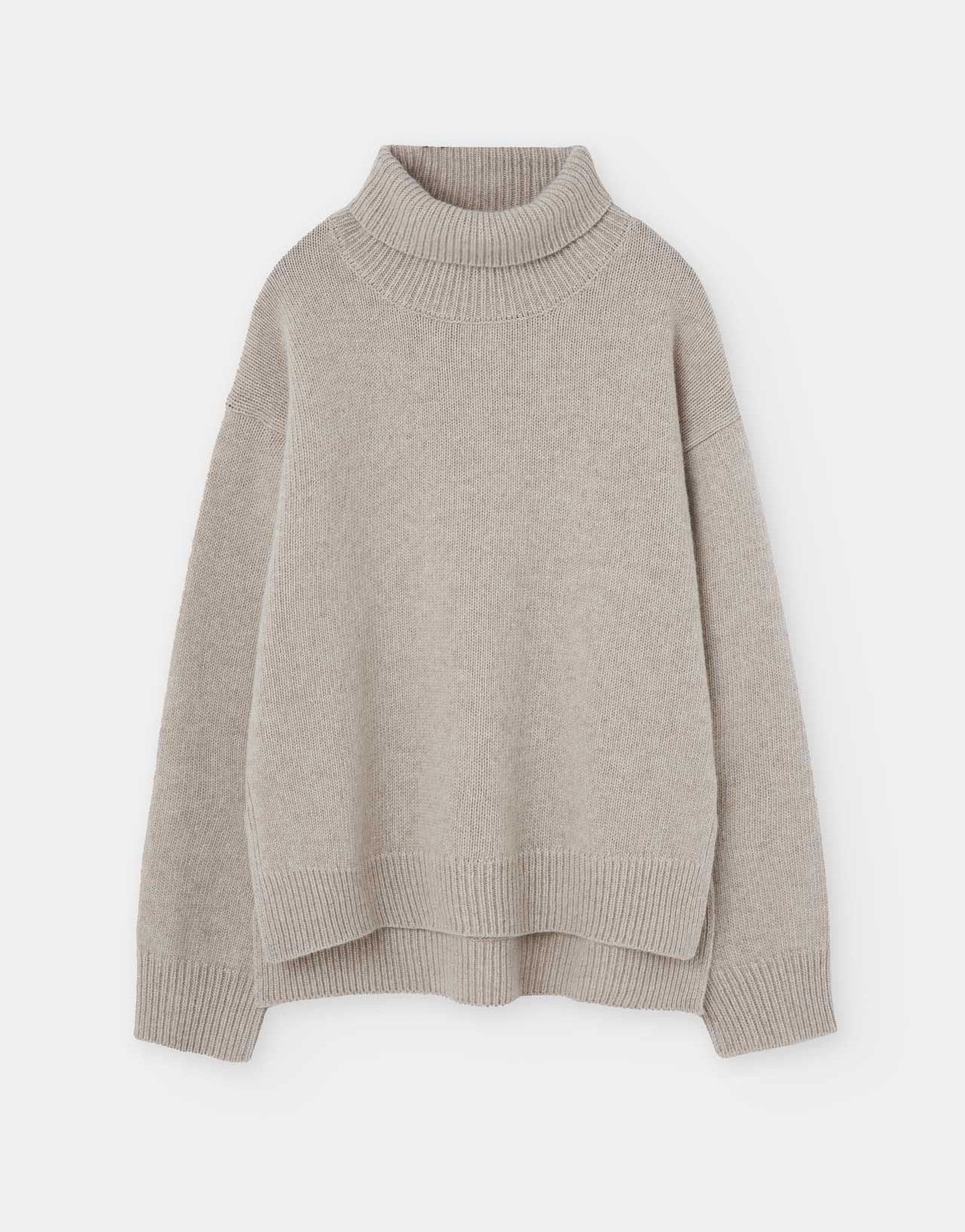 natural coloured knitted rollneck sweater on a white background