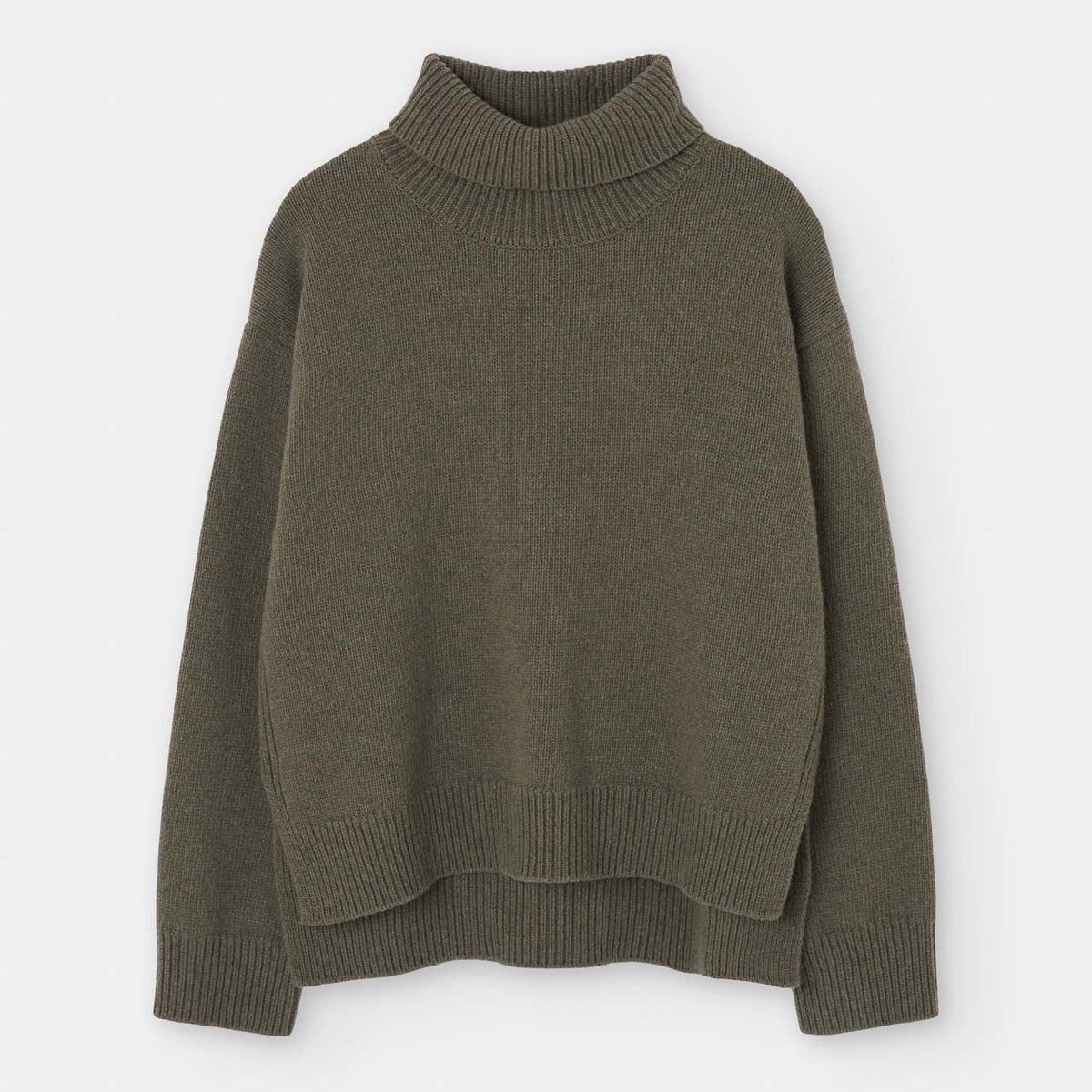 Loreak Mendian Isla W Wool Rollneck Knit - Khaki, a chunky merino wool turtleneck with ribbed collar, cuffs, and hem, shown on a plain white background.