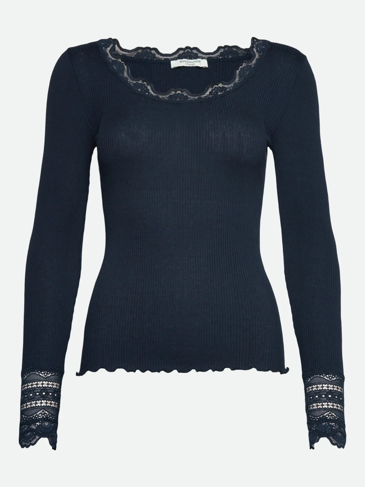 The Rosemunde Long-Sleeve Silk Lace Top in navy blue is crafted from a luxurious blend of silk and cotton. This slim-fitting knit features delicate lace detailing along the neckline and cuffs, as well as elegant scalloped edges, embodying timeless sophistication.