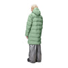 person shows the back of the long matte light green padded puffer by rains. 