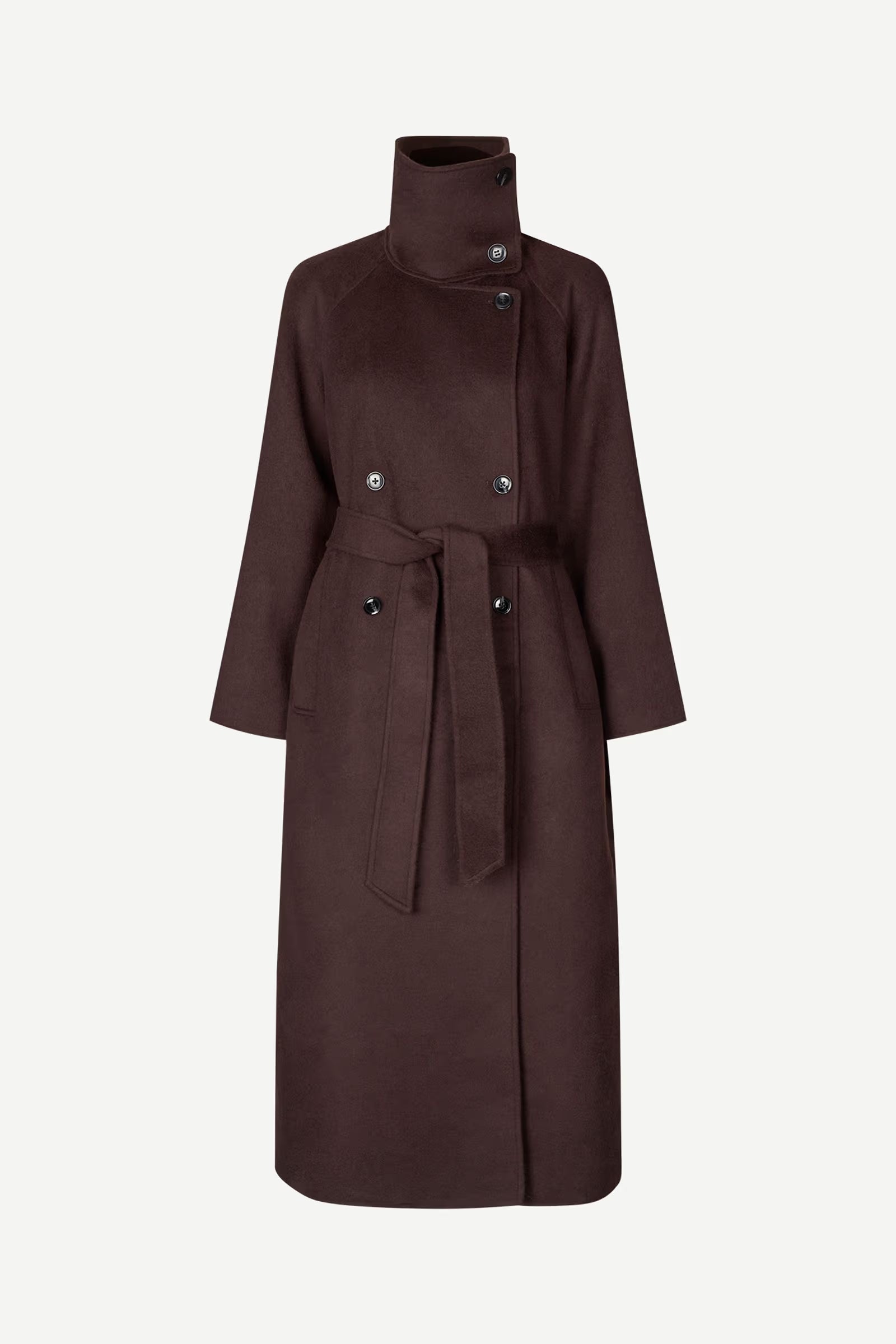 The Sahanne Coat - Black Coffee by Samsøe Samsøe is a dark brown, oversized felted coat made from recycled wool, featuring a high collar, double-breasted buttons, long sleeves, and a matching belt tied at the waist, shown against a plain white background.