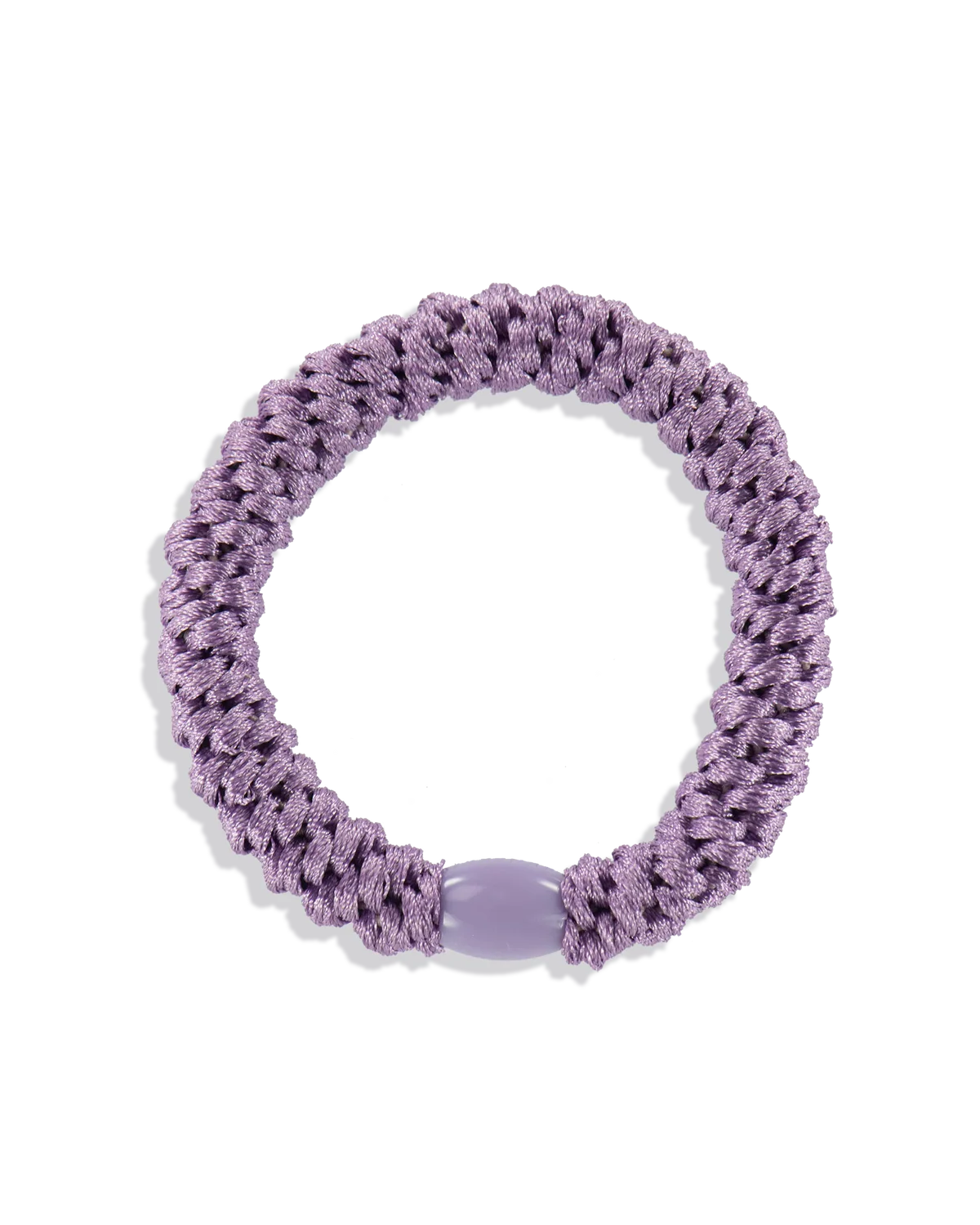 The KKNEKKI Hair Tie - Original in purple features a braided design with a smooth oval bead and gentle grip, shown on a plain white background.