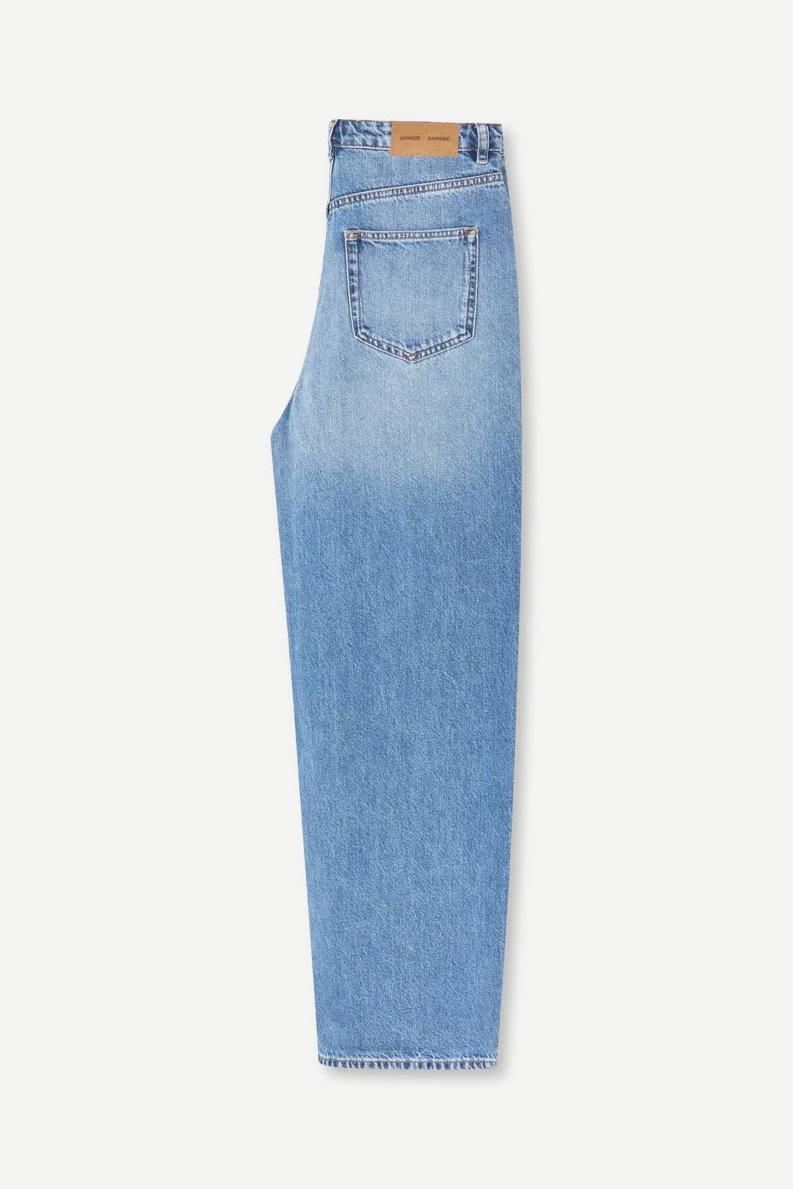 The Sashelly Jeans - Retro Wash by Samsøe Samsøe are displayed flat, showcasing the back view with a light blue straight-leg denim design, featuring a single rear pocket and a tan leather patch on the waistband.