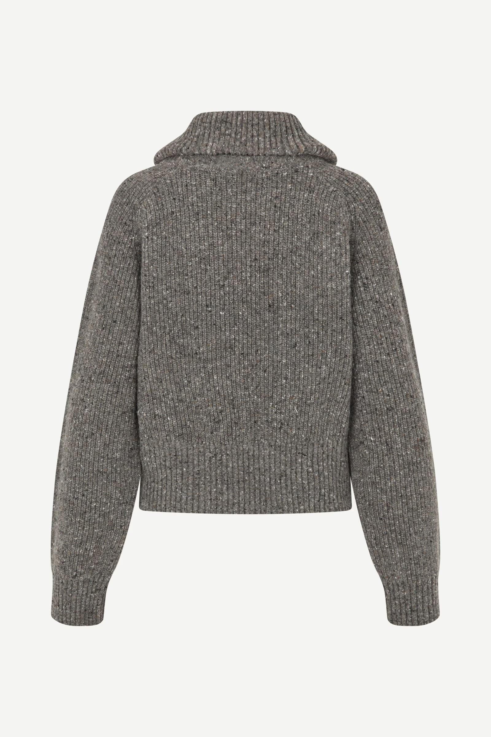 Back view of the Saamandy Turtleneck by Samsøe Samsøe in Lead Grey Melange, featuring a rib-knit texture, long sleeves, a folded turtleneck collar, and a slightly cropped hem.