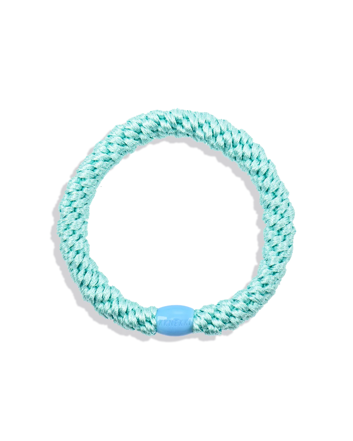 The KKNEKKI Hair Tie - Original is a teal, coiled elastic hair tie with a small blue oval connector, providing a gentle grip and waterproof design, displayed on a plain white background.