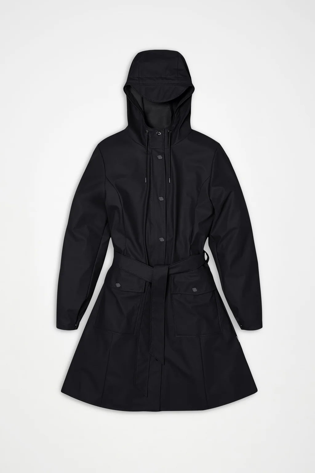 The Curve W Jacket W3 by Rains is a black women's raincoat featuring a hood, front buttons, waist belt, and two spacious front pockets, displayed flat on a white background. Lightweight and waterproof, this jacket seamlessly combines style and practicality for rainy days.