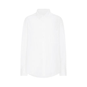 White oversized womens cotton shirt against a white backdrop 
