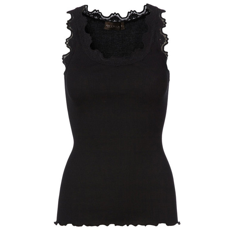 A Rosemunde silk lace top with signature lace trim, perfect for lounge wear.