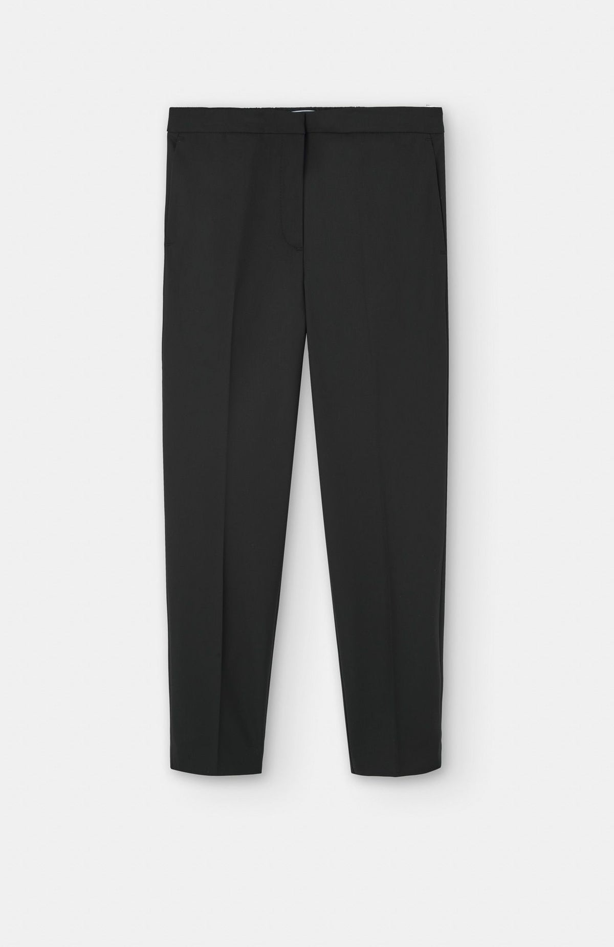 Black Alaiak Trouser - Black straight-leg trousers with center creases, designed as versatile joggers for everyday wear.