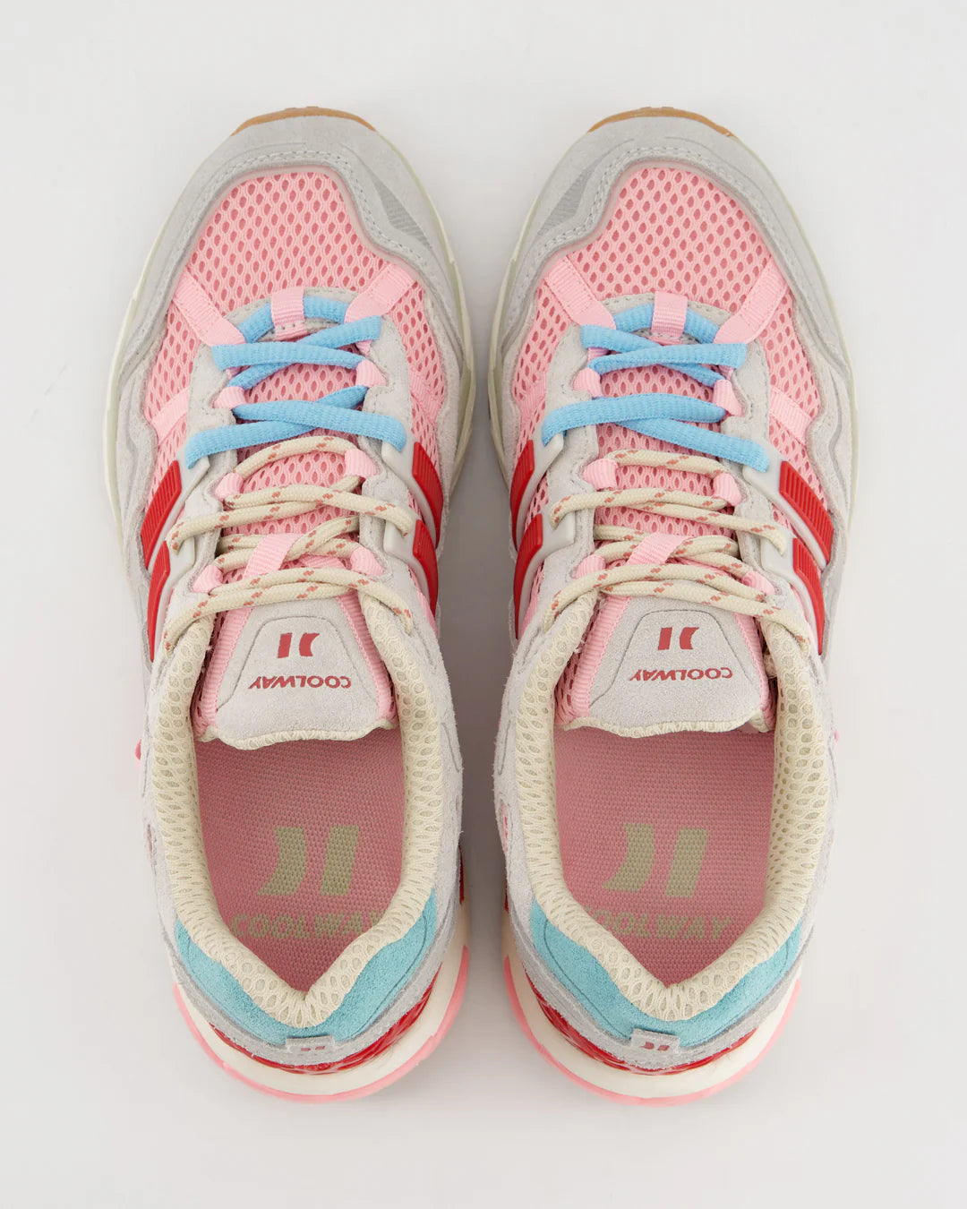 A pair of Coolway 2003 Sneakers - Pink Volt, featuring mesh uppers and suede leather accents in pink, red, and light blue, viewed from above on a white background—ideal for stylish comfort seekers.