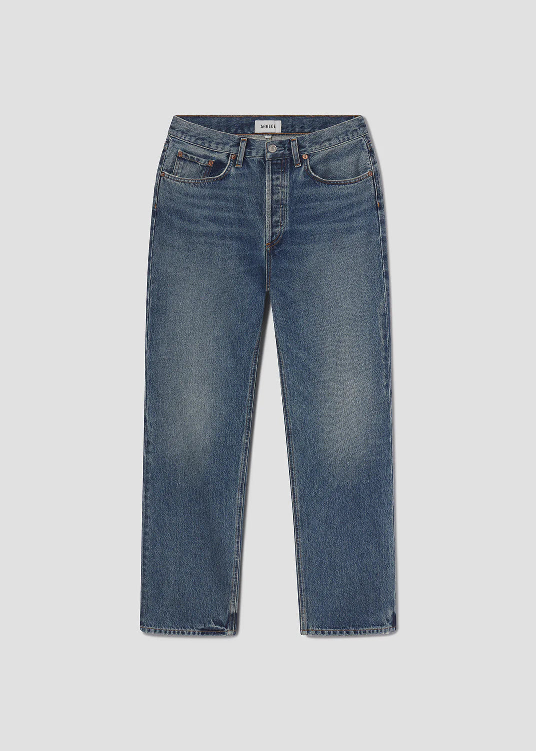 The Lana Jean - Liberty by AGOLDE is a vintage-inspired straight-leg blue jean featuring a classic five-pocket design, button closure, and subtle front fading, crafted from regenerative cotton denim.