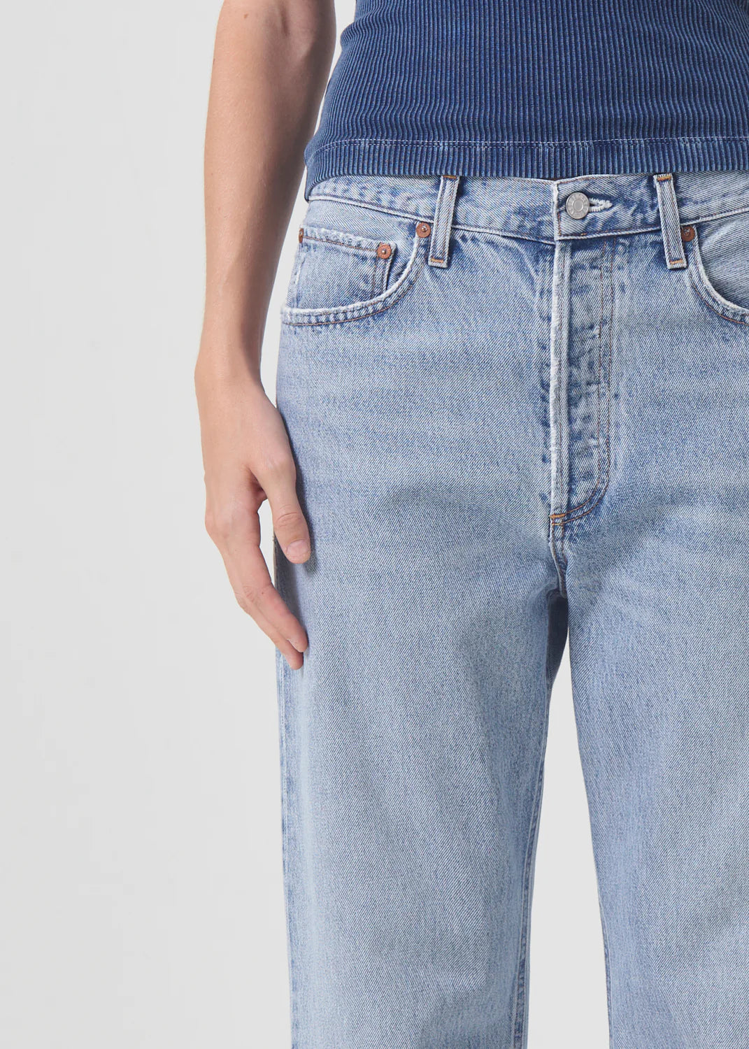 AGOLDE women's retro-inspired straight leg jeans in light blue.