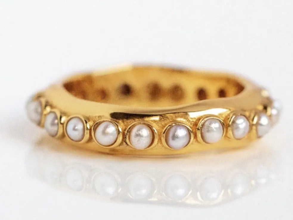 A unique SHYLA - Astri Ring Pearl - Gold ring handcrafted with pearls.