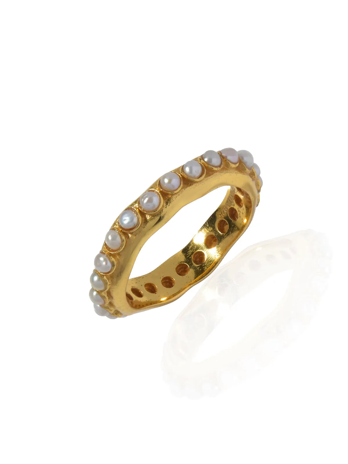 A unique SHYLA - Astri Ring Pearl - Gold handcrafted with pearls on it.
