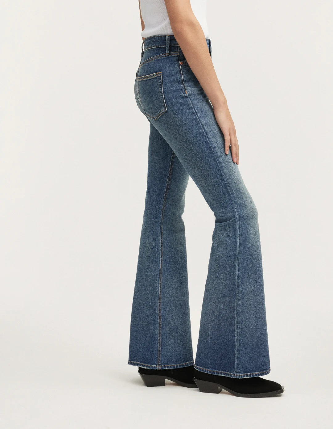 High rise flare jean in mid blue wash
