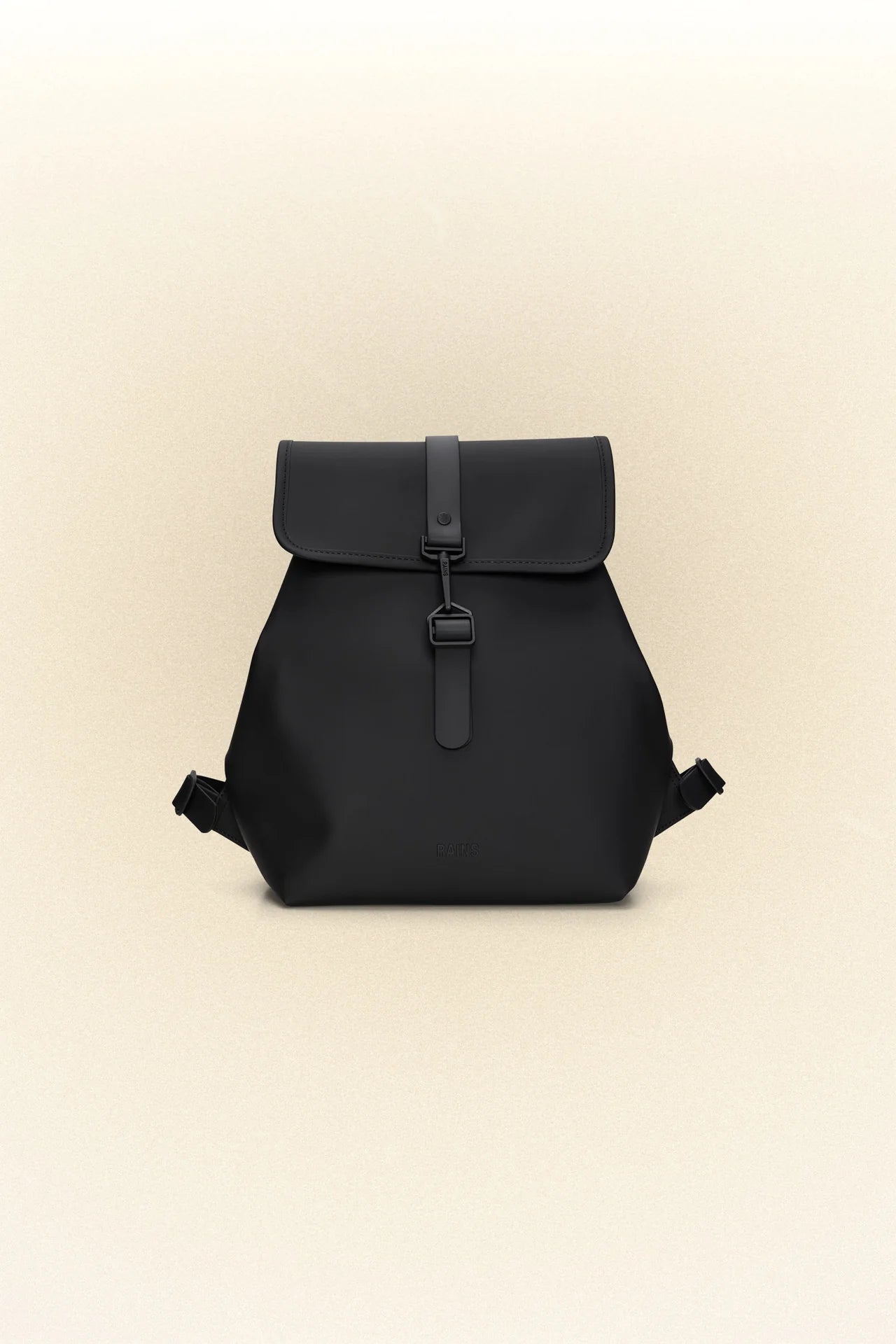 A waterproof Bucket Backpack - Black made of PU coated fabric on a beige background by Rains.
