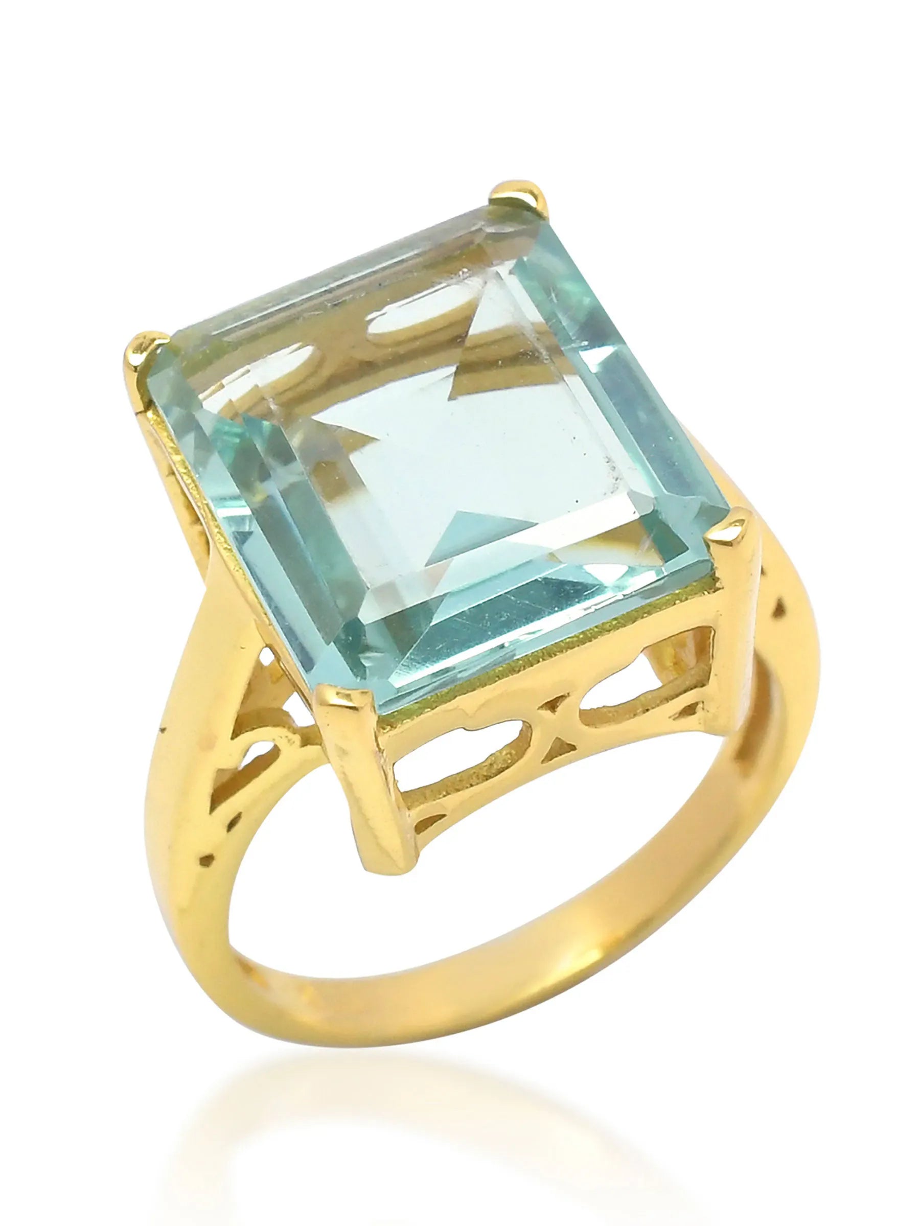 The SHYLA - Claudia Ring - Gold from Shyla features a vibrant aqua topaz, set in lustrous yellow gold, for a stunning and colorful vintage look.