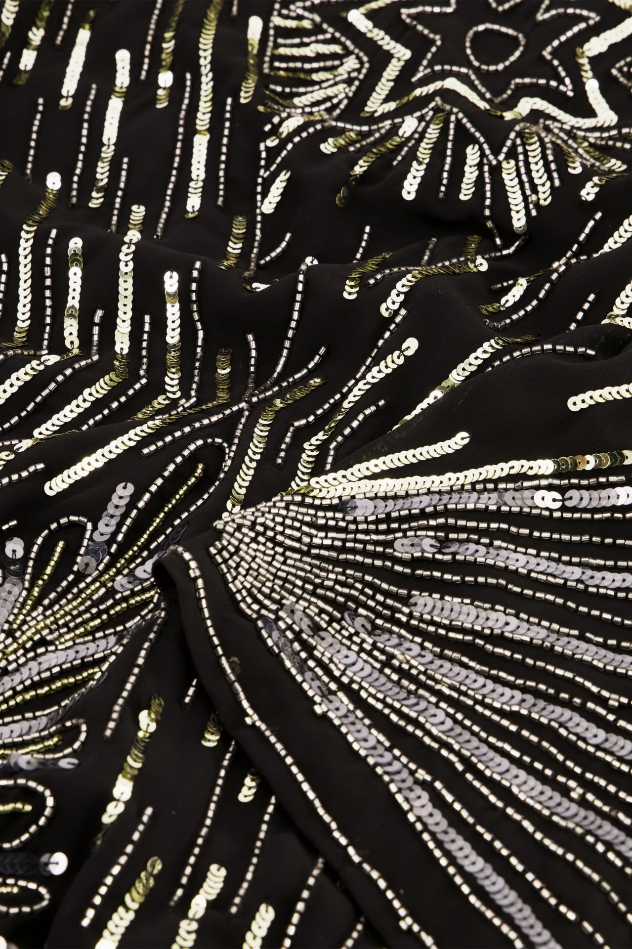 A Zali Dress - Black by Fabienne Chapot with gold sequin details.