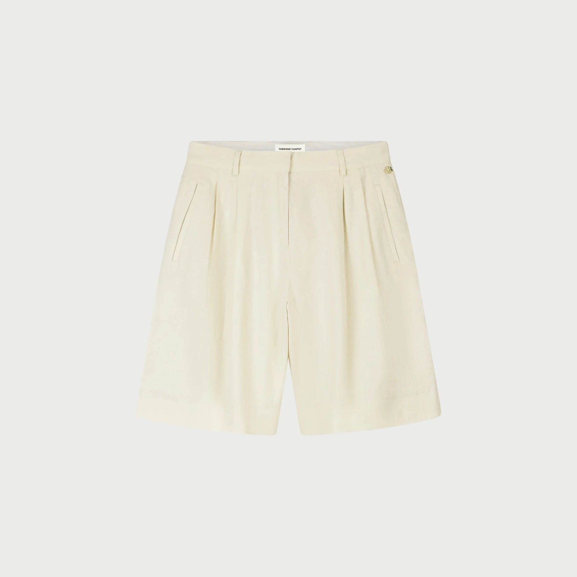 Beige shorts on a light beige background