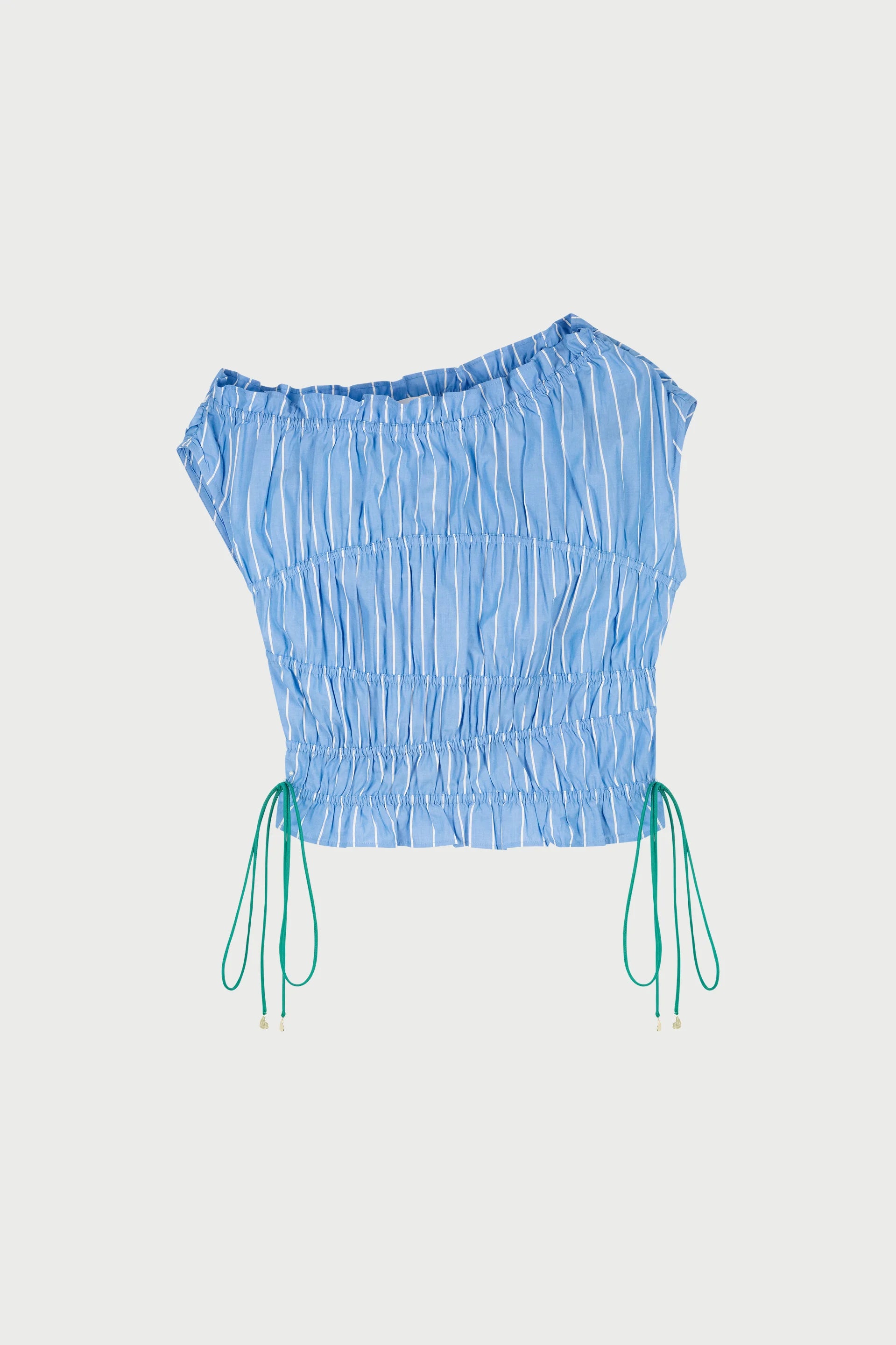 The John Ruched Top by Fabienne Chapot in marine blue features short sleeves, an off-shoulder asymmetrical neckline, vertical white stripes, a gathered waist, and green adjustable side drawstrings—crafted from soft organic cotton.