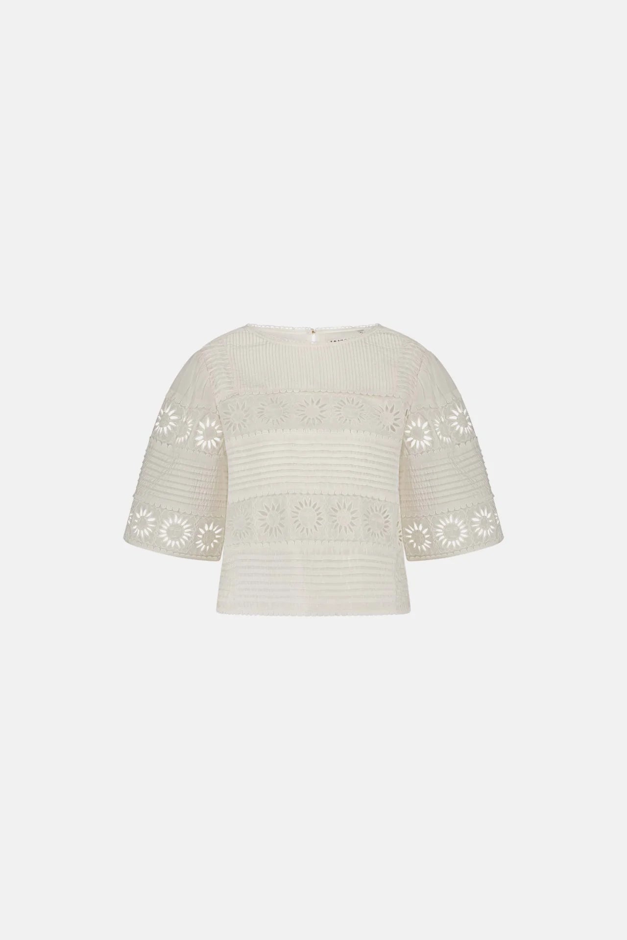 Cosy White Sun Top by Fabienne Chapot, featuring floral cutout patterns and a round neckline, crafted from an organic blend knit, shown on a plain white background.