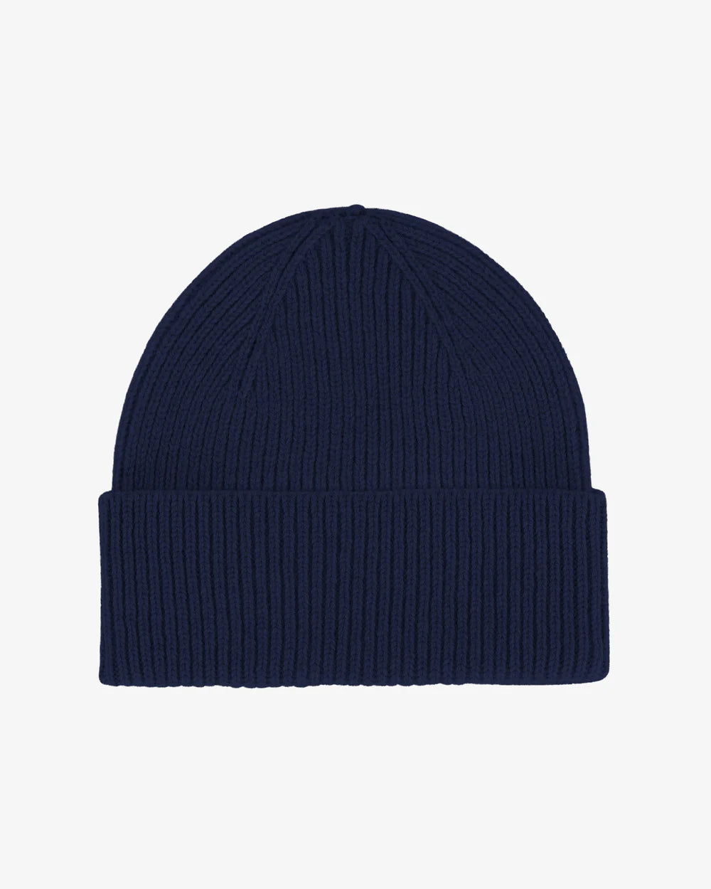The Colorful Standard Merino Wool Beanie is a navy blue, single fold hat made from breathable fibers and recycled merino wool, featuring a folded brim and shown on a plain white background.