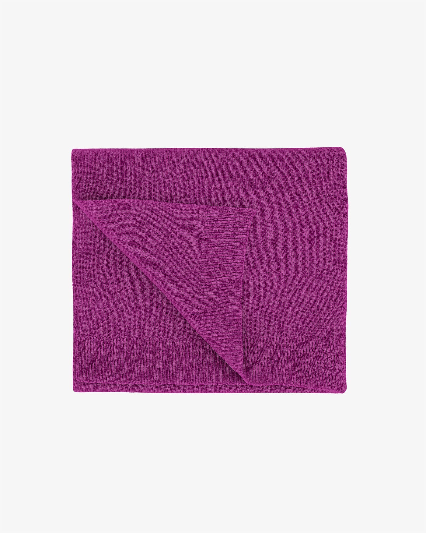 A folded purple Merino Wool Scarf with ribbed edges, made from recycled merino wool by Colorful Standard, displayed on a plain background.