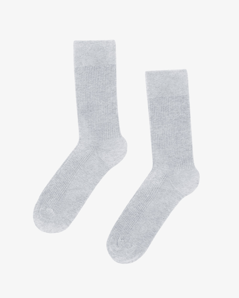 The Classic Organic Sock from Colorful Standard is a breathable, light gray pair made of organic cotton, set against a plain white background.