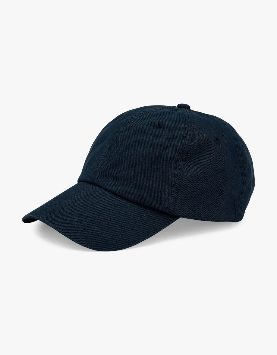 A Colorful Standard organic cotton navy baseball cap on a white background, soft and comfortable.