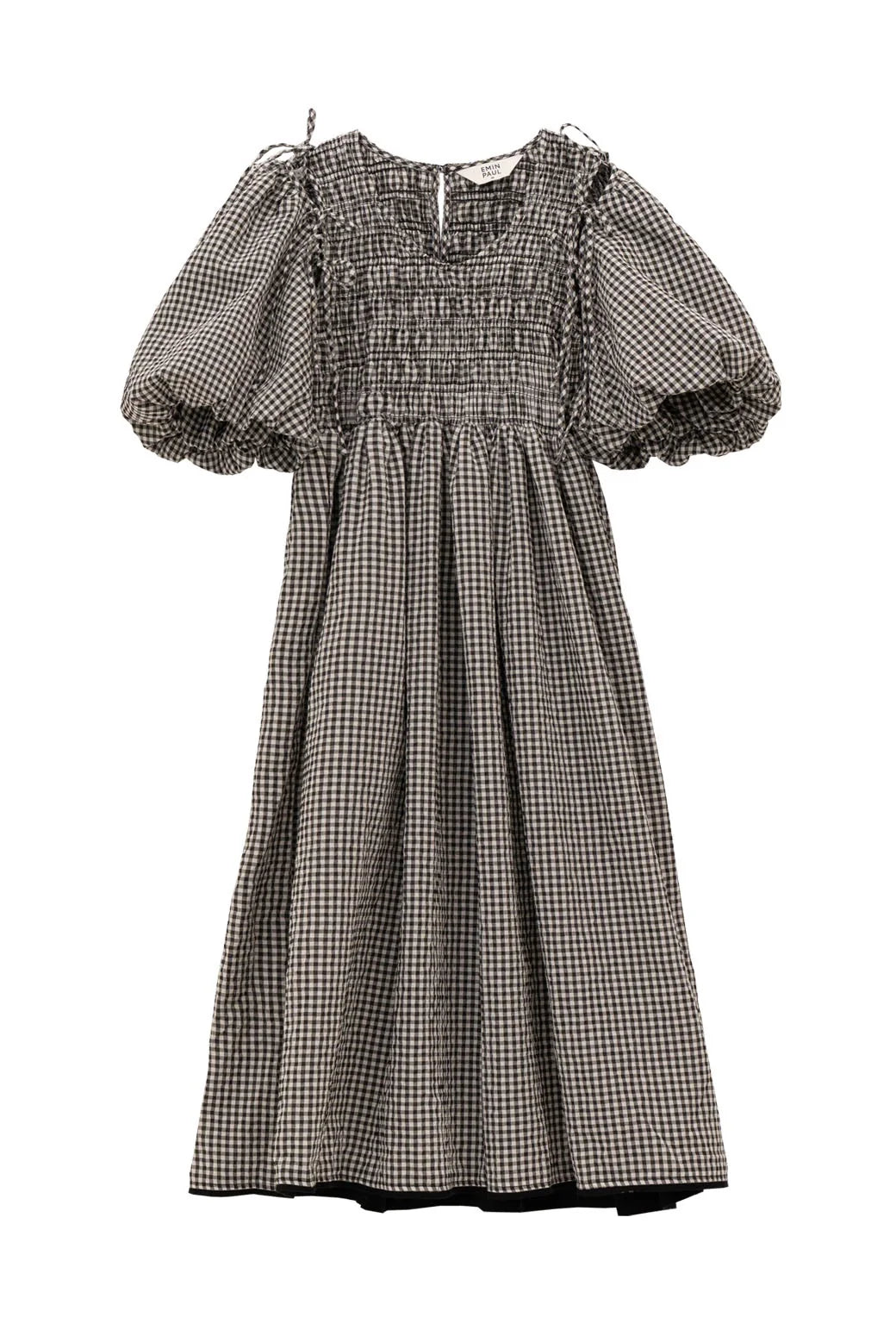 The Emin and Paul Puff Sleeve Tie Dress - Black Check is crafted from 100% cotton with a smocked bodice, puff short sleeves, detachable sleeves option, and a rounded neckline in classic black and white gingham.