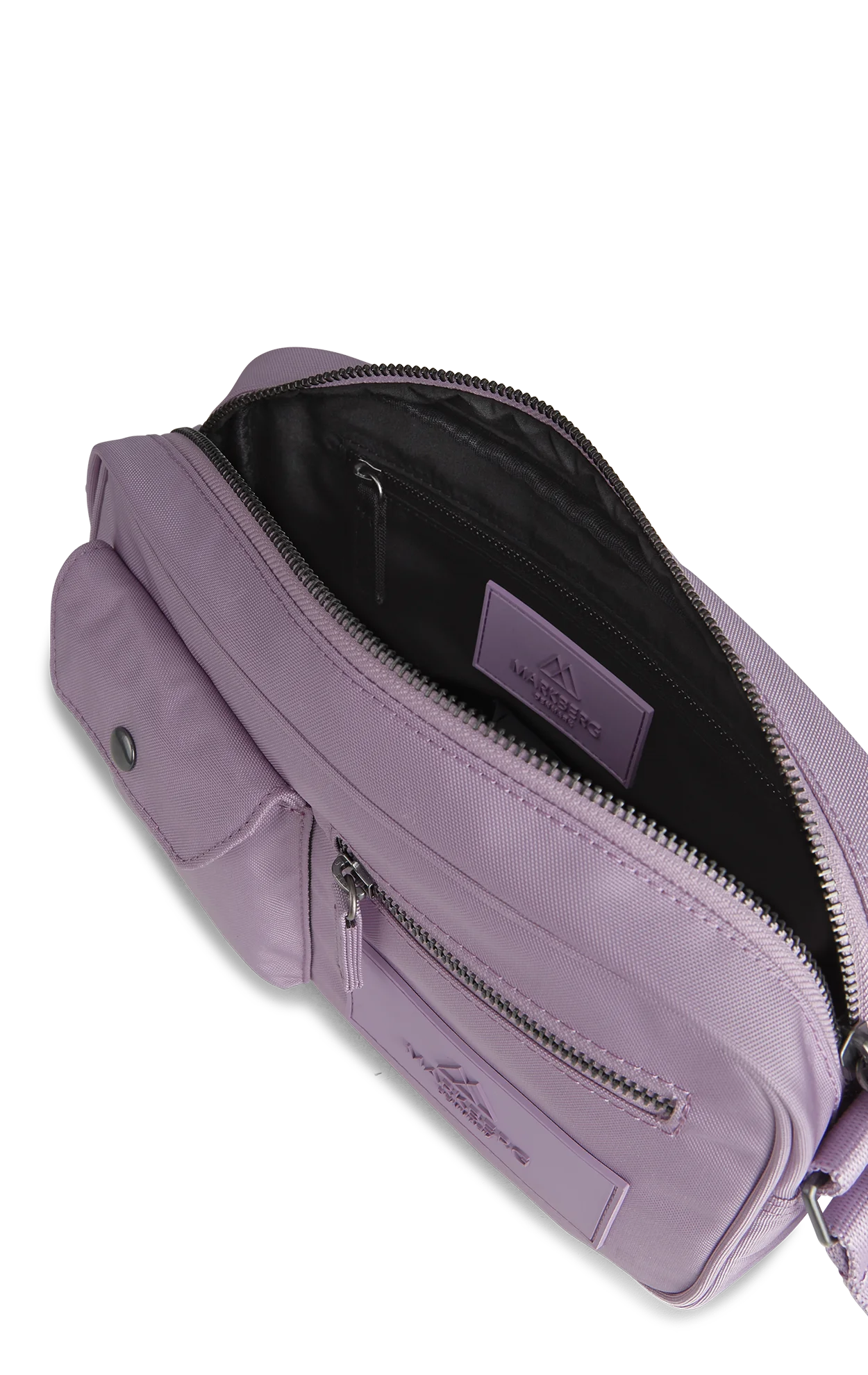 A partially unzipped Markberg Darla Crossbody Bag in Polar Purple against a transparent background.
