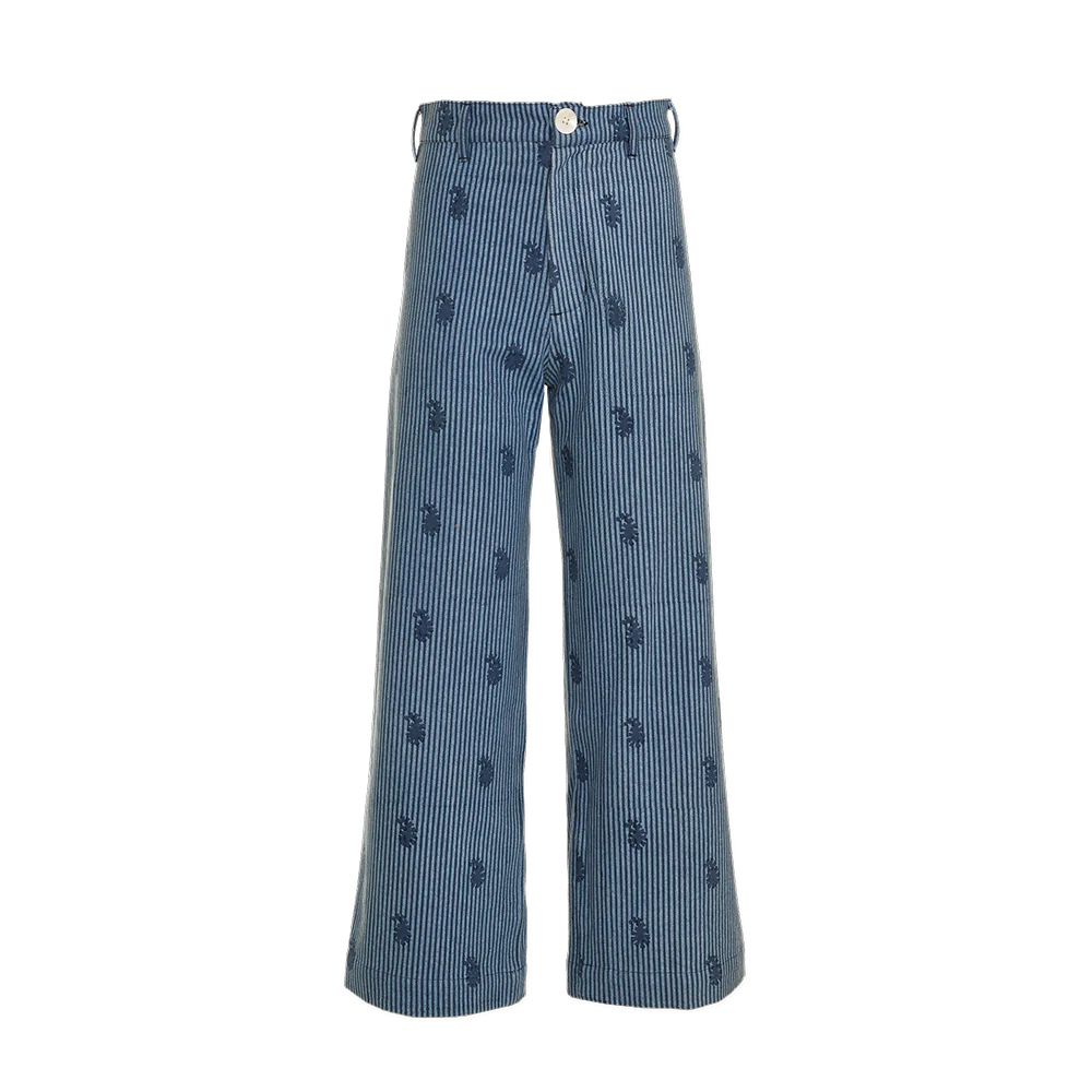 The Disco Pant - Denim Paisley by SZ Blockprints features a high waist with button closure, adding charm with its vertical stripes and small palm tree prints.