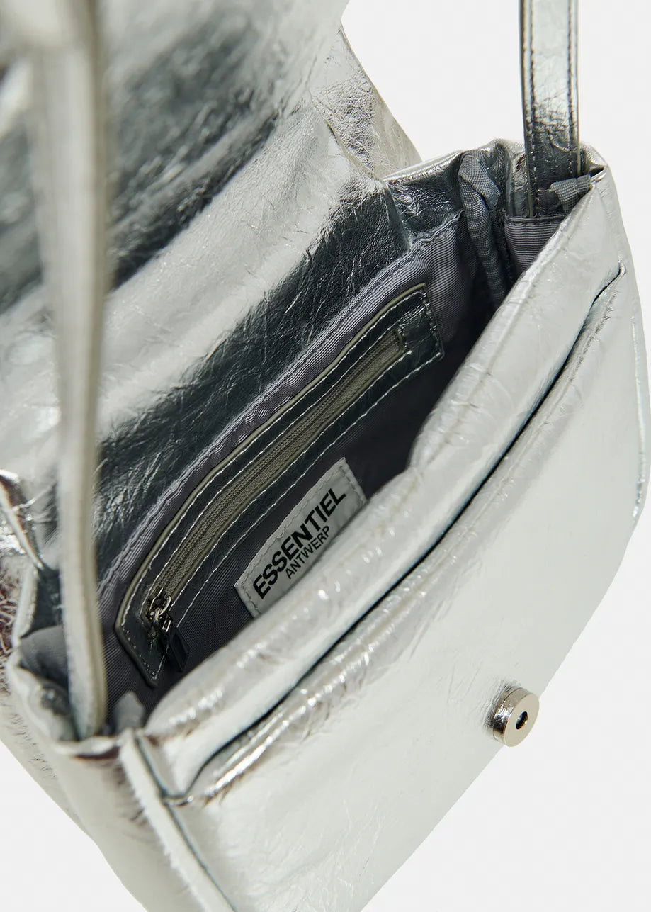 The glossy interior of a Fecamel Bag by Essentiel Antwerp.