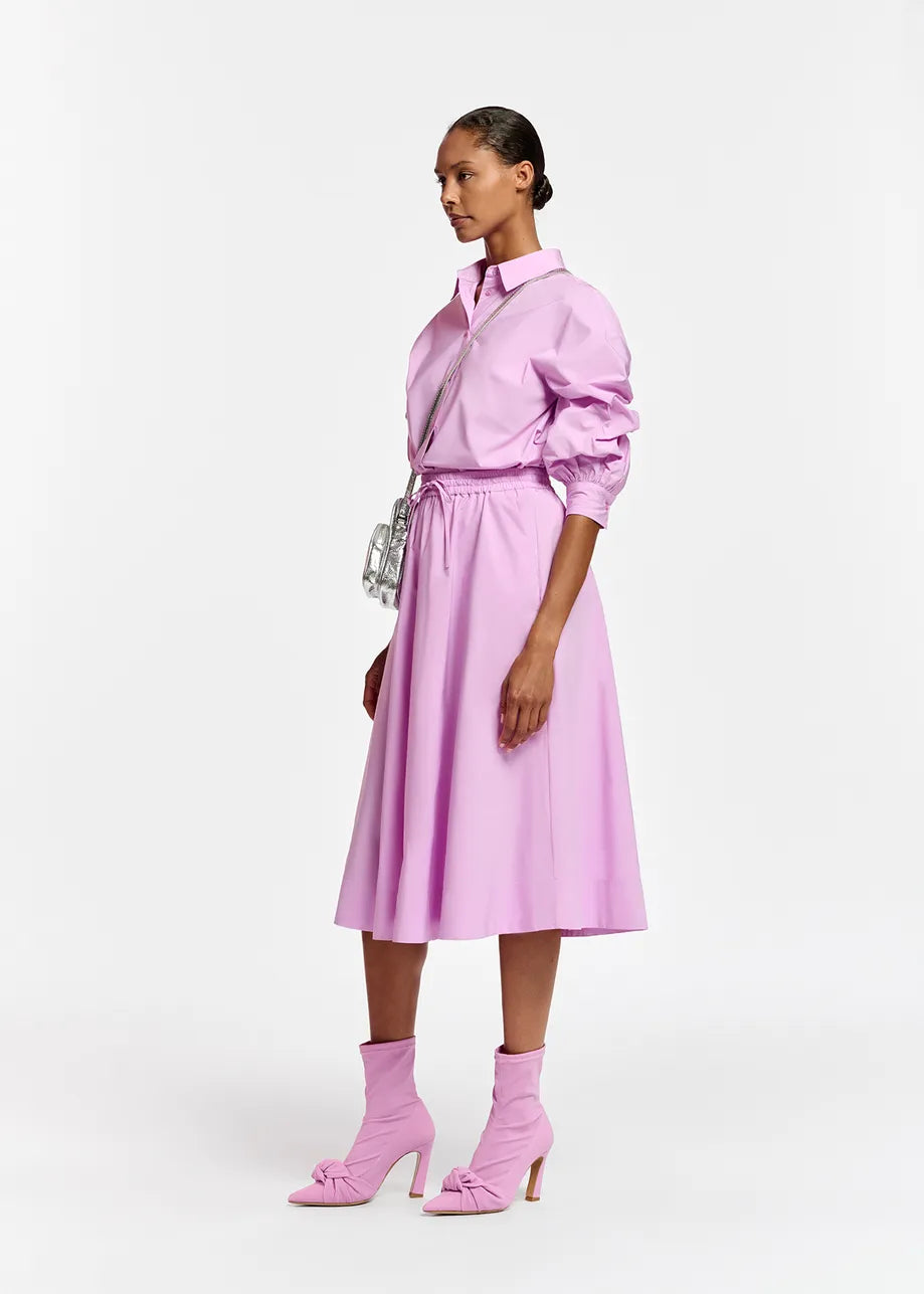 Model wears lilac A-line midi skirt