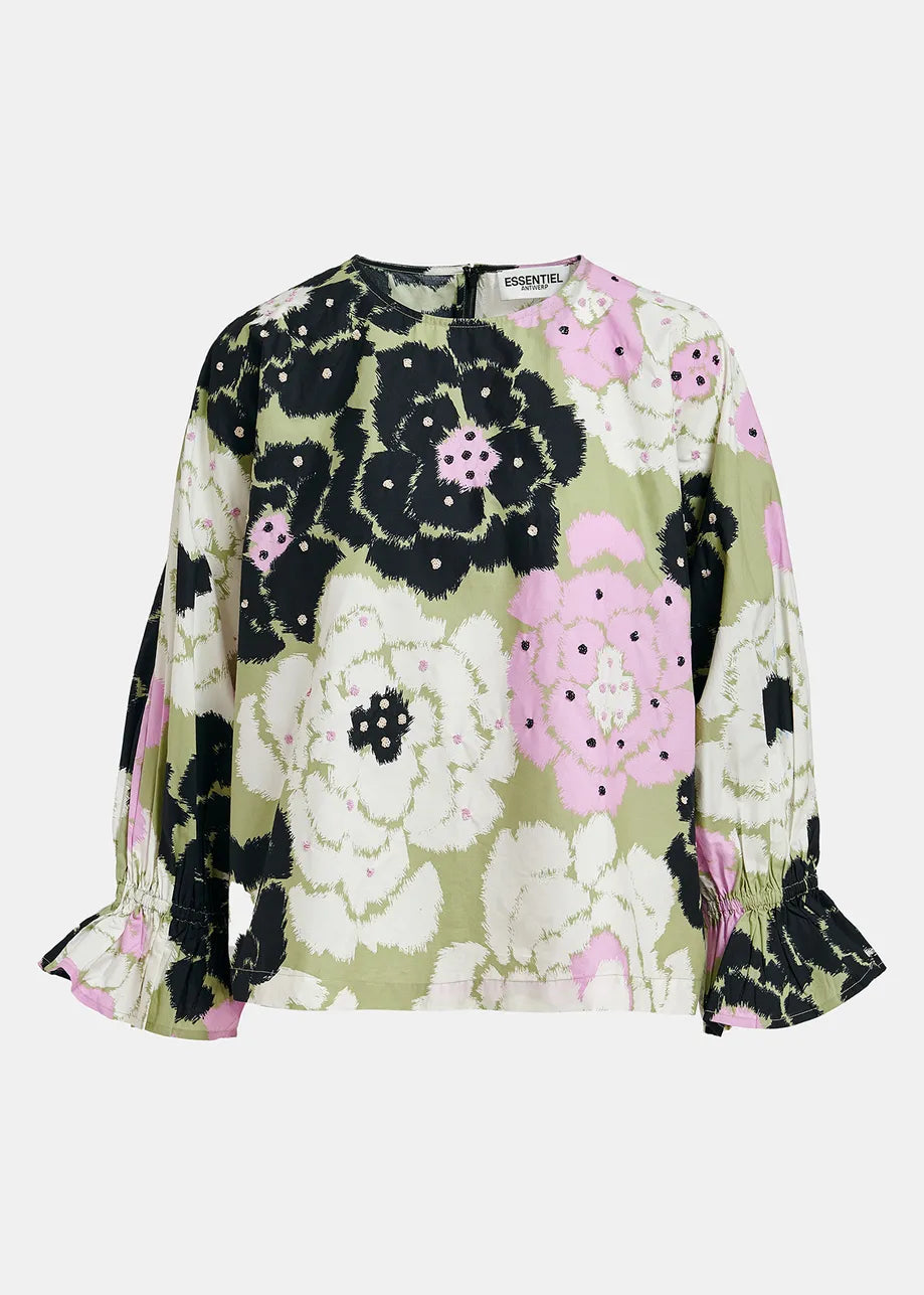 Model wears floral top with 3/4 length sleeves and floral pattern in white, khaki, pink and black