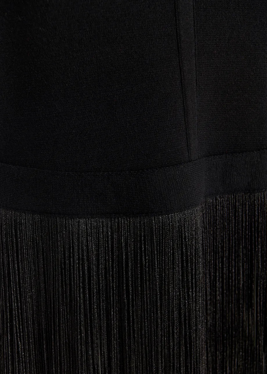 Close-up view of the Gabbers Fringed Top - Black by Essentiel Antwerp, featuring a smooth upper section and a textured, fringe-like lower section.