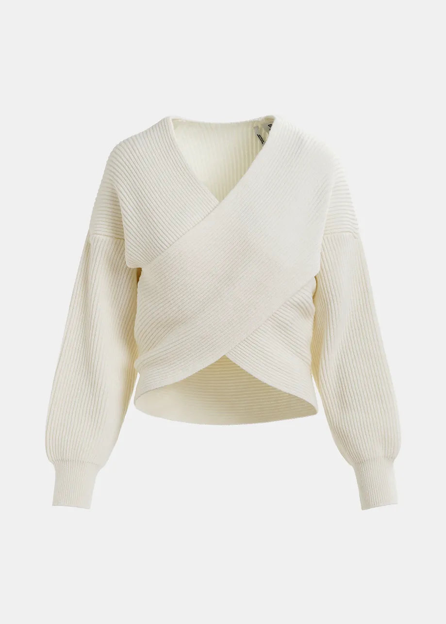 The Essentiel Antwerp Gustaph Cross-over Knit in white showcases a wrap-style front, long sleeves, and ribbed cuffs for a relaxed fit.