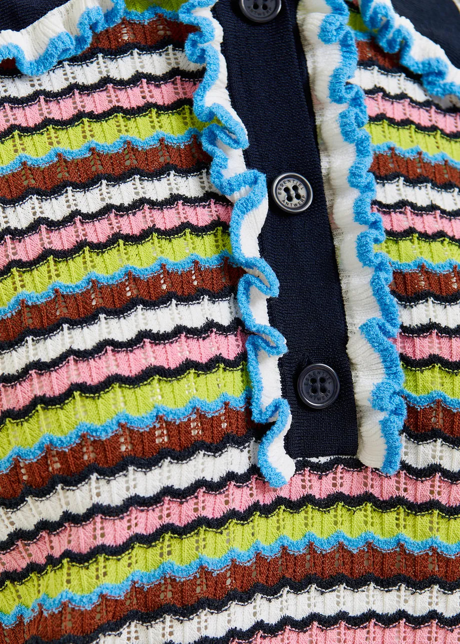 Close-up of the Haximum Ruffled Polo by Essentiel Antwerp, featuring vibrant stripes, a blue ruffled collar trim, and black buttons on a navy placket.