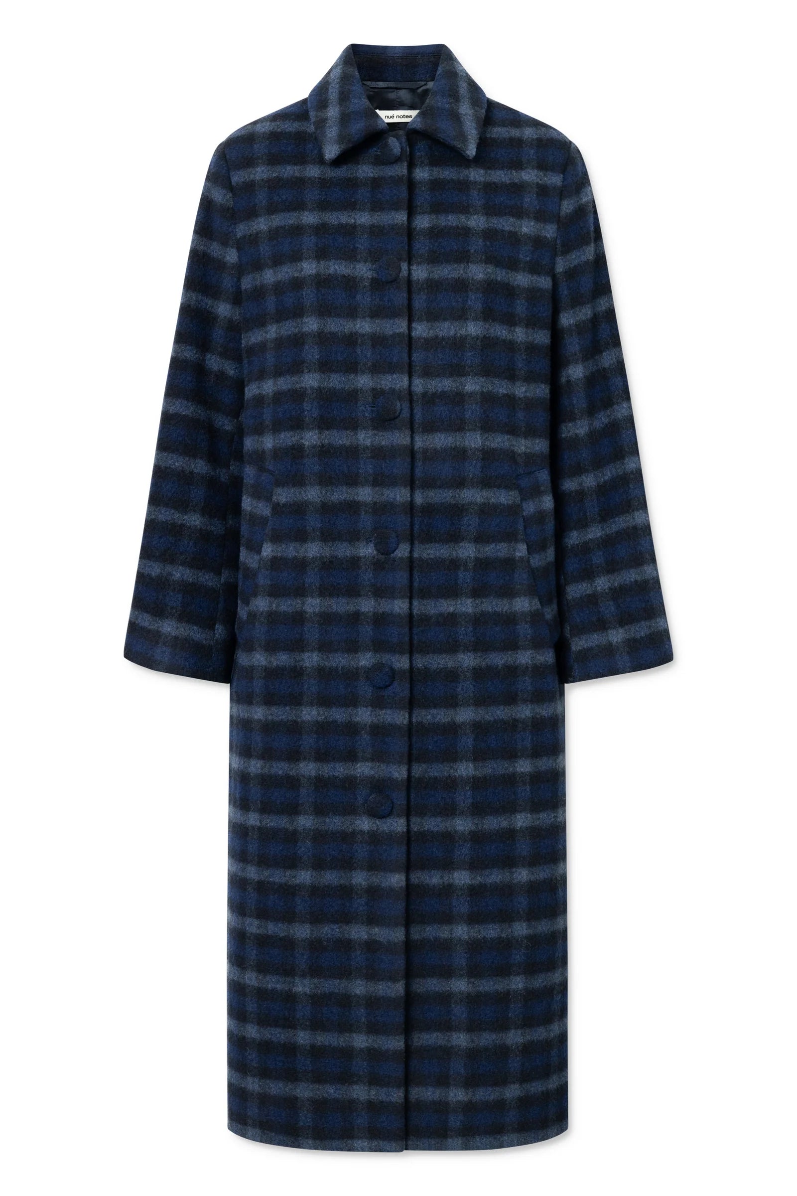 The Nué Notes Helsinki Coat in navy features a blue and black plaid pattern, button-up front, collar, and long sleeves. Displayed on a white background.