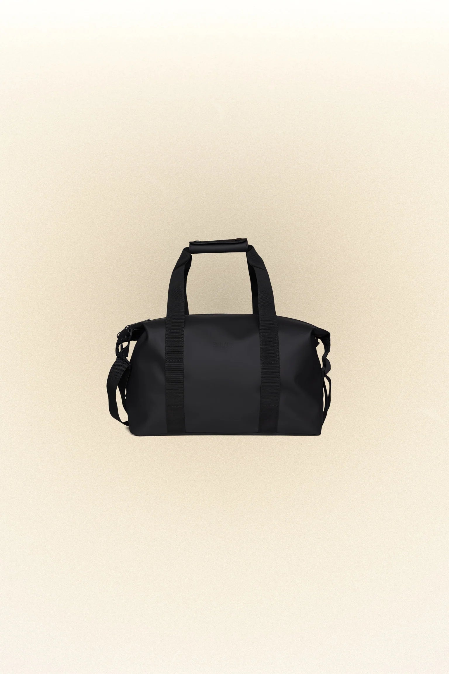A small, Hilo Weekend Bag Small - Black by Rains on a white background.